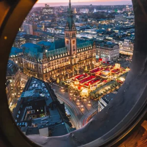 Top view of illuminated Christmas market on townhall square in advent time, Hamburg, Germany Top view of illuminated Christmas market on townhall square in advent time, Hamburg, Germany